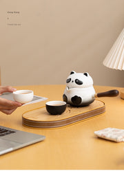 panda side handle tea set laptop scene