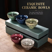Five colorful ceramic tea cups with textured glaze