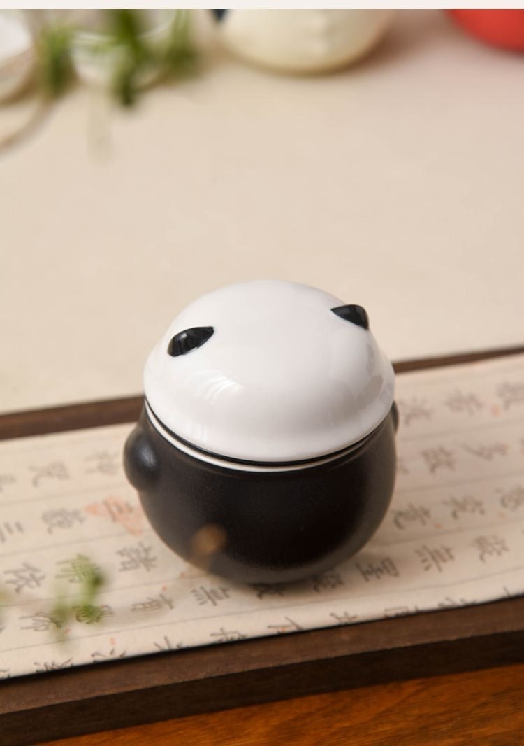 Black Panda travel teapot close up with panda lid
