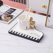 White Piano Key Tea Cup with treble clef handle and piano keyboard tray