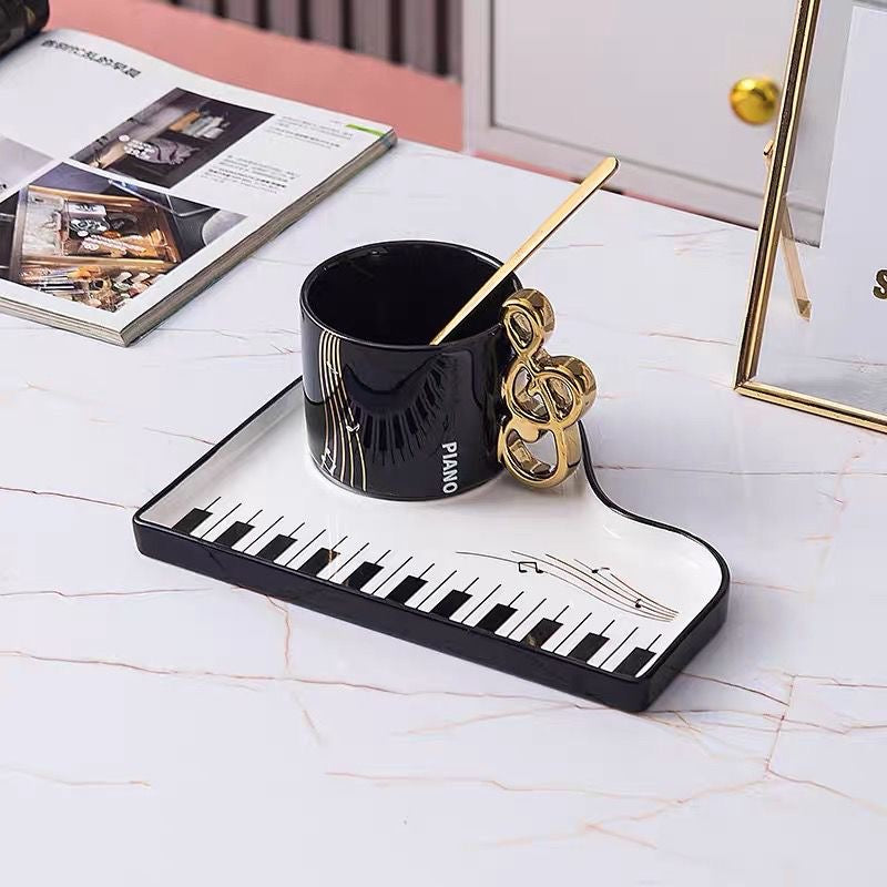 Black Piano Key Tea Cup with treble clef handle and piano keyboard tray