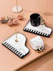Styled gift scene with black and white Piano Key Tea Cup sets