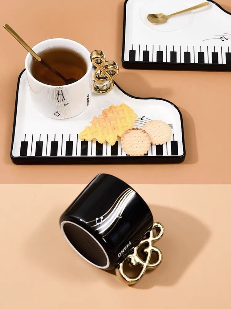 White Piano Key Tea Cup with tea and snacks