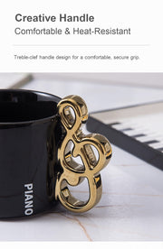 Piano Key Tea Cup gold treble clef handle detail