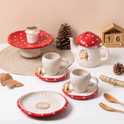 Red mushroom ceramic teapot cup saucer dessert stand and round dessert plate scene