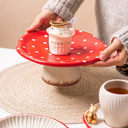 Red mushroom ceramic dessert stand with cupcake